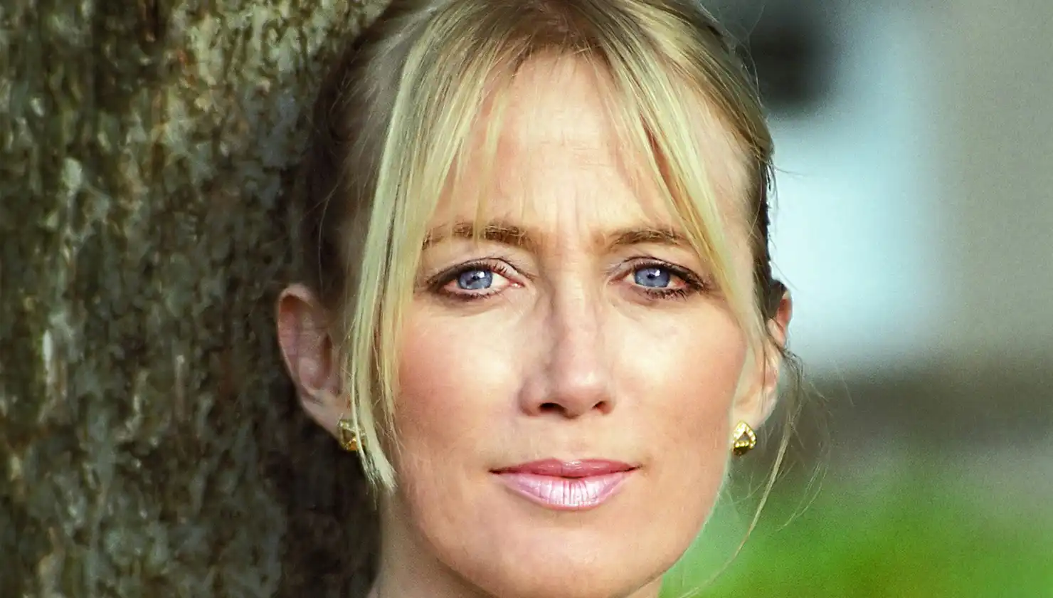 blond woman outdoors - potential eyelid lift patient